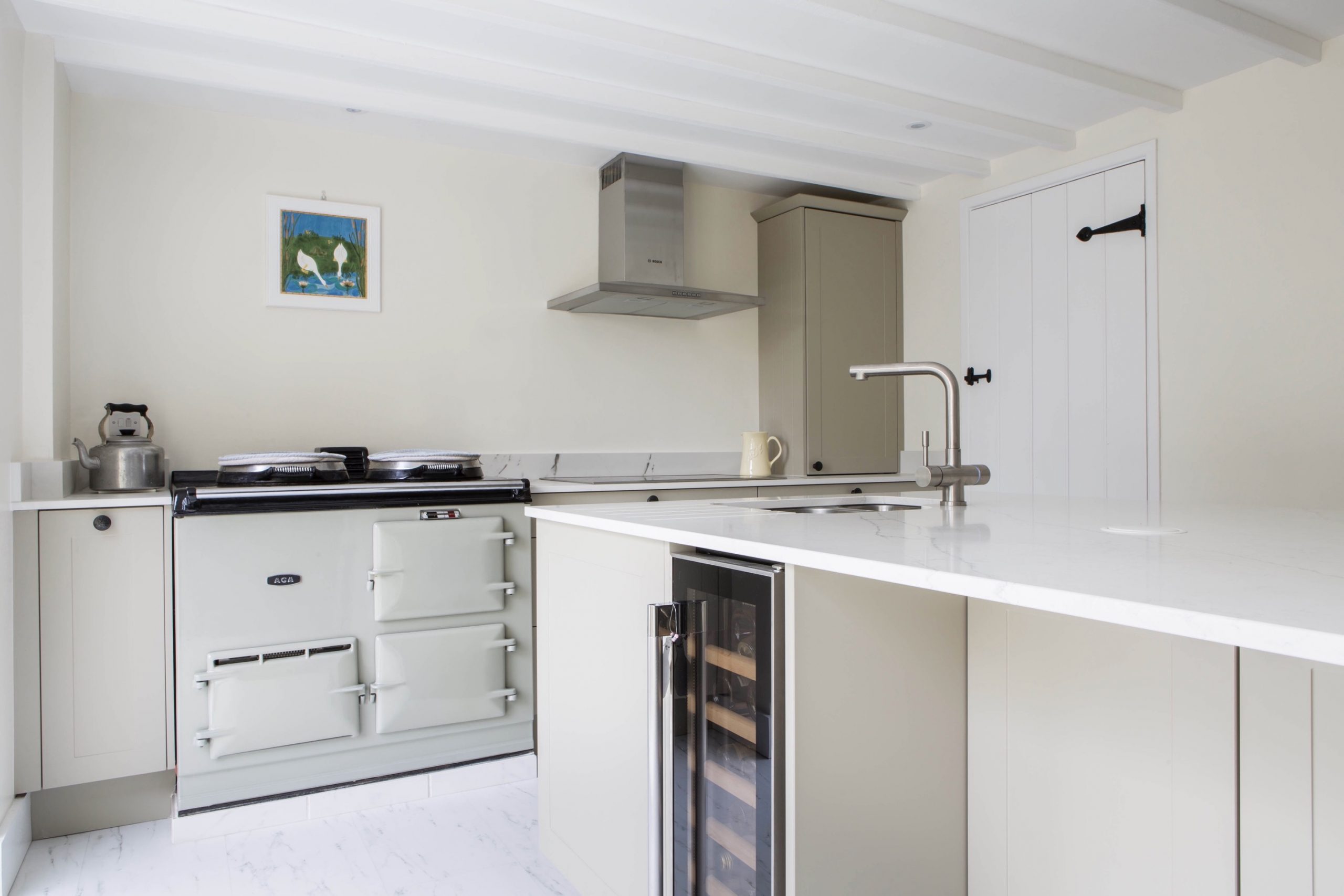 Aga range cooker white quartz breakffast bar kitchen island worminghall buckinghamshire 1 scaled