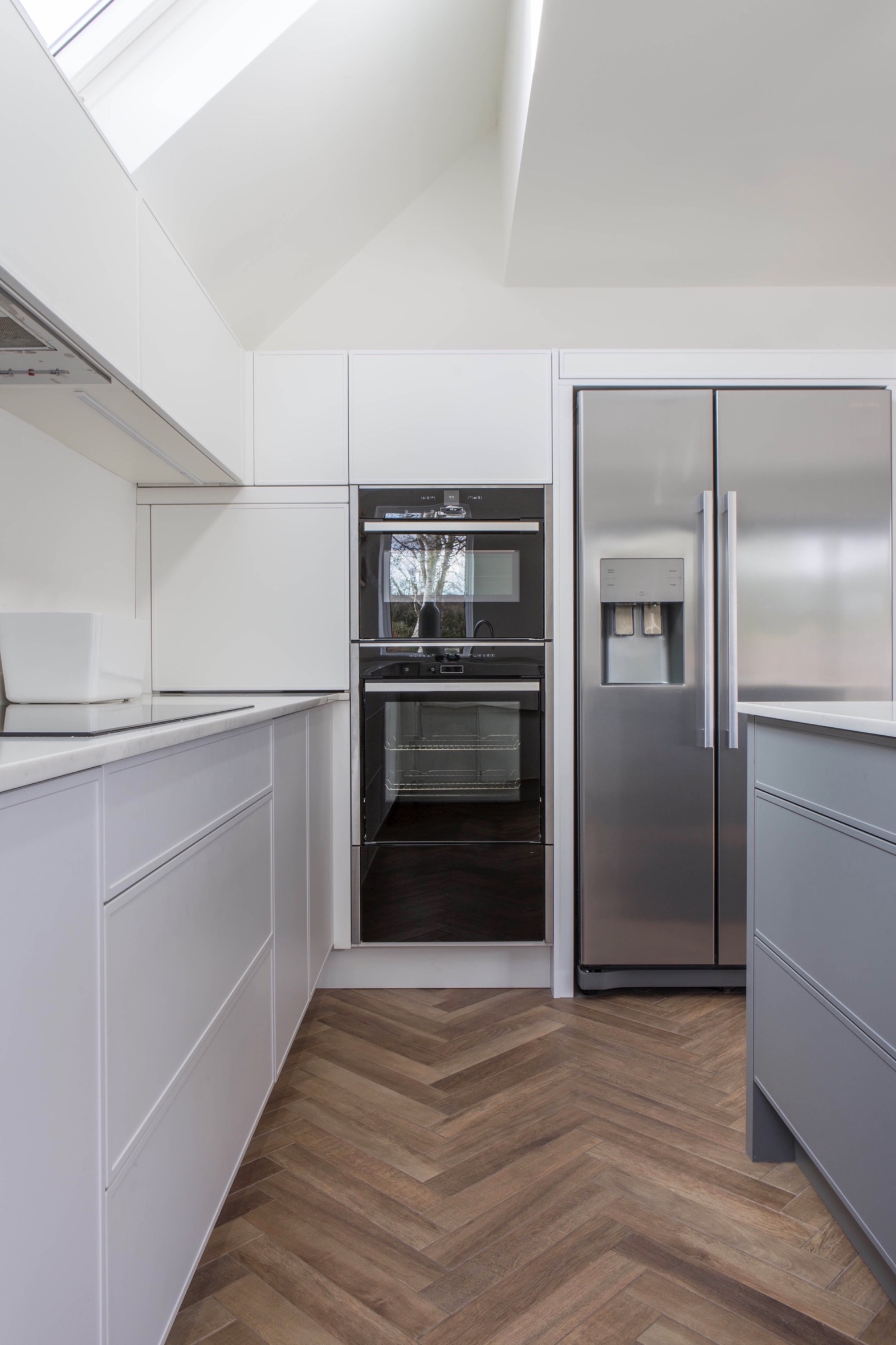 bright skylight kitchen oxfordshire grey handleless stainless steel fridge tall oven thame 1